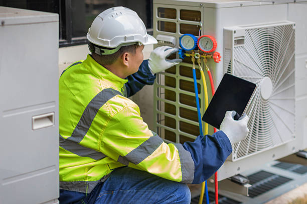 Professional Hvac Installation technician working in Jensen Beach, FL
